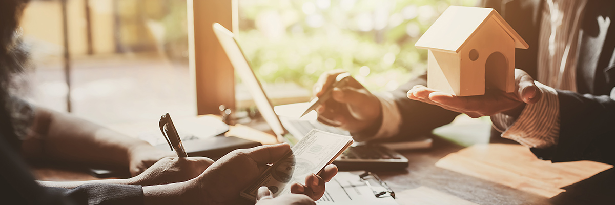 man and woman discussing ways to pay for luxury townhome
