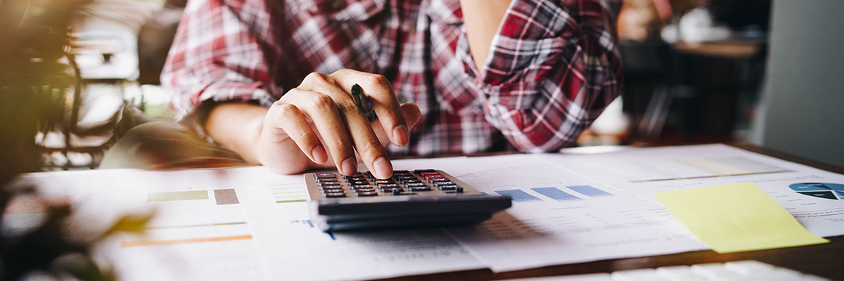 man calculating mortgage for park city townhome